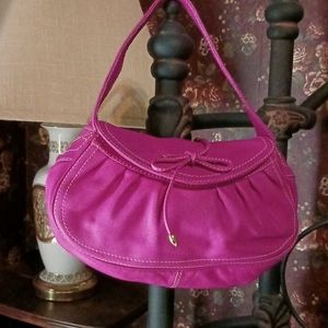 Pretty Bloomingdale's Pink leather handbag.
